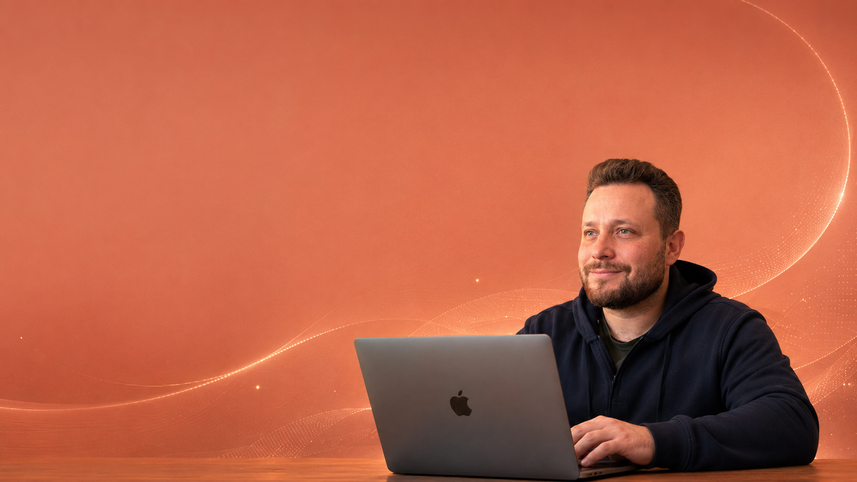 Startup founder working with an AI coding assistant on a laptop